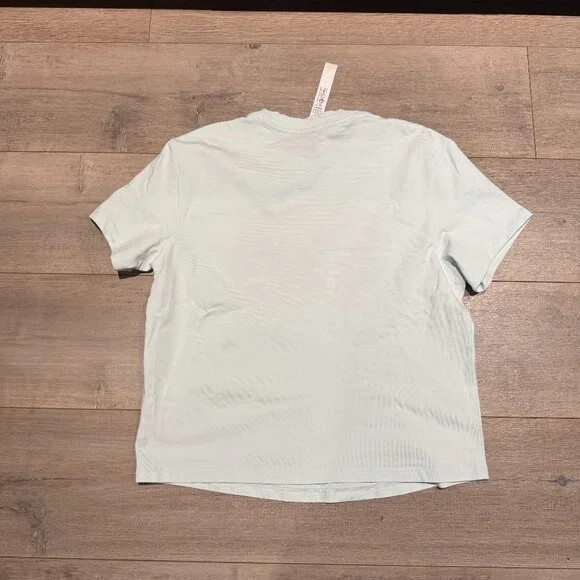 Lululemon Light Blue T-shirt (Size 4 Great Condition) - Picture 7 of 9